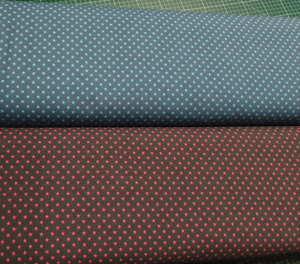 Baumwolljersey Sterne braun - fuchsia