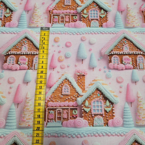 Baumwoll Webware Lebkuchenhaus und Weihnachten auf rosa