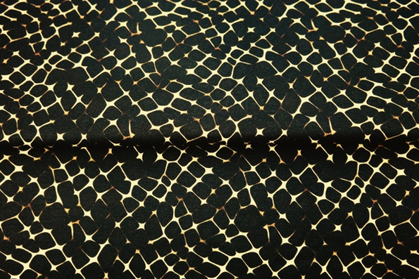 Baumwolljersey mit Muster auf schwarz - "Schillerndes Gitter"